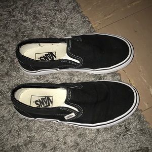 Vans black slip ons